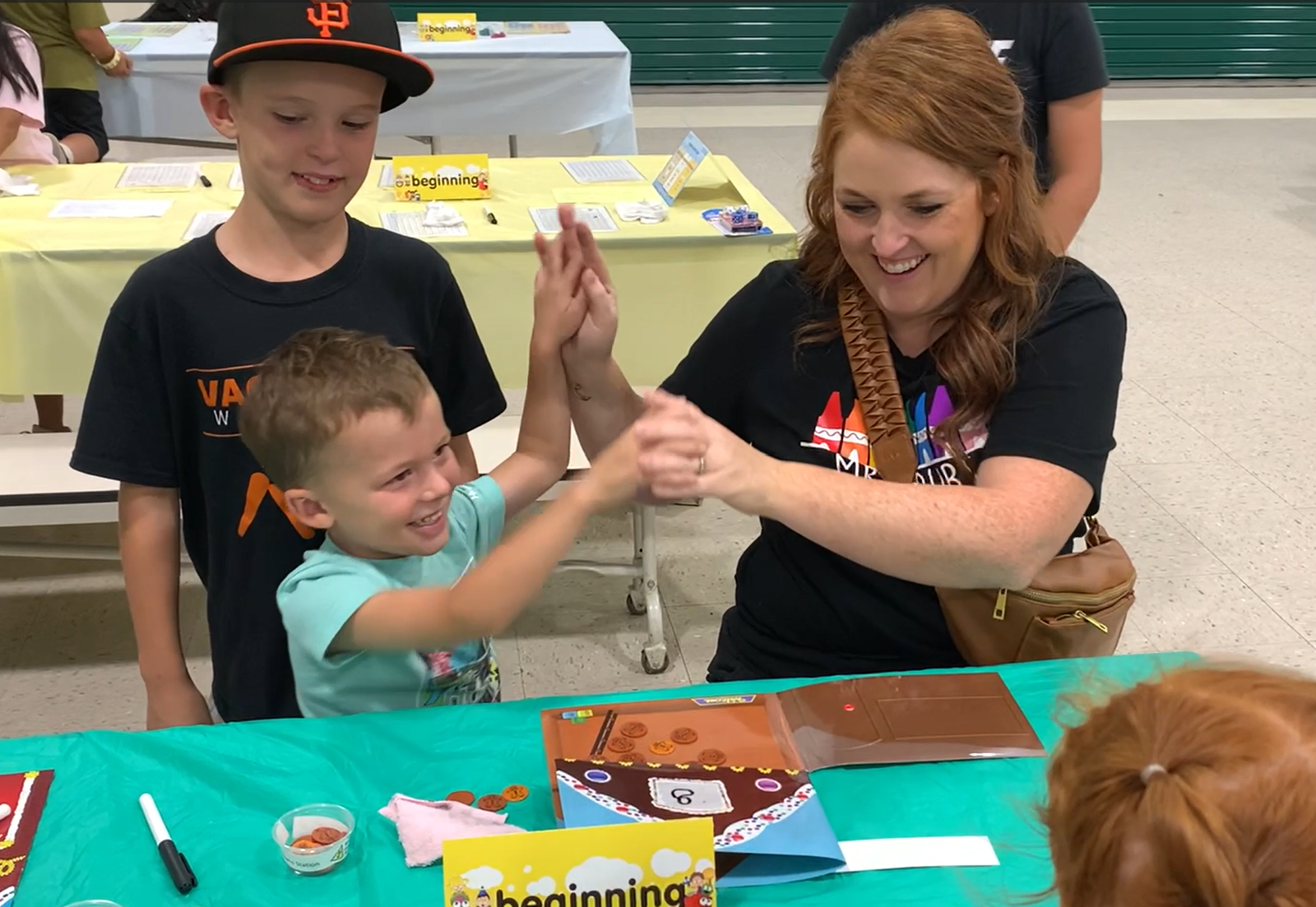 Family Math Night event participants enjoying the activities